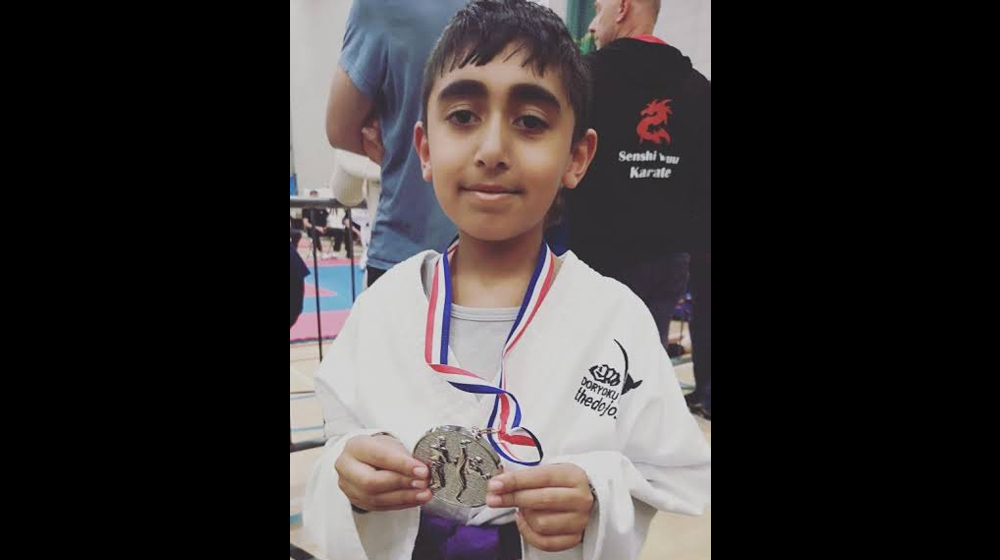 8-year-old becomes the youngest to win big at Martial Arts Championship