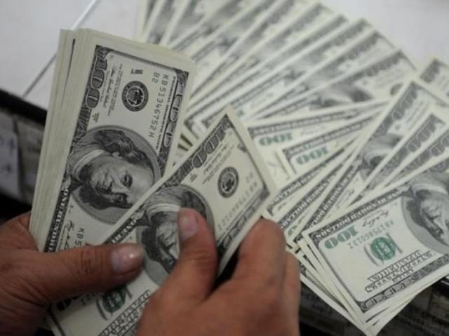 Dollar touches eight-month high against rupee