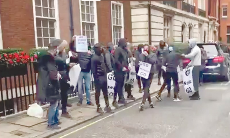 Dozens of protesters yell slogans outside Nawaz’s London residence