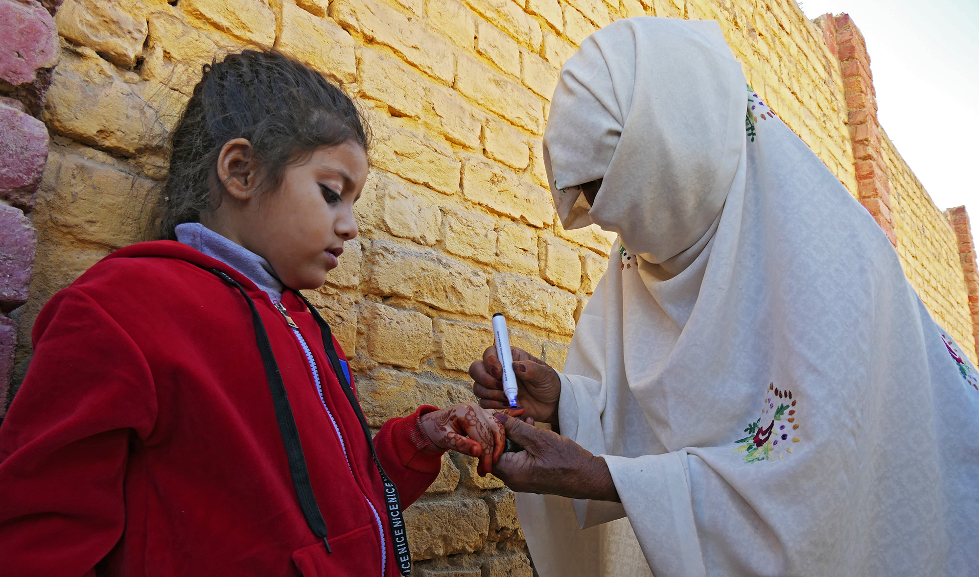 77-year-old ‘Dadi’ does her part in Polio eradication by administering drops to children in Pishin
