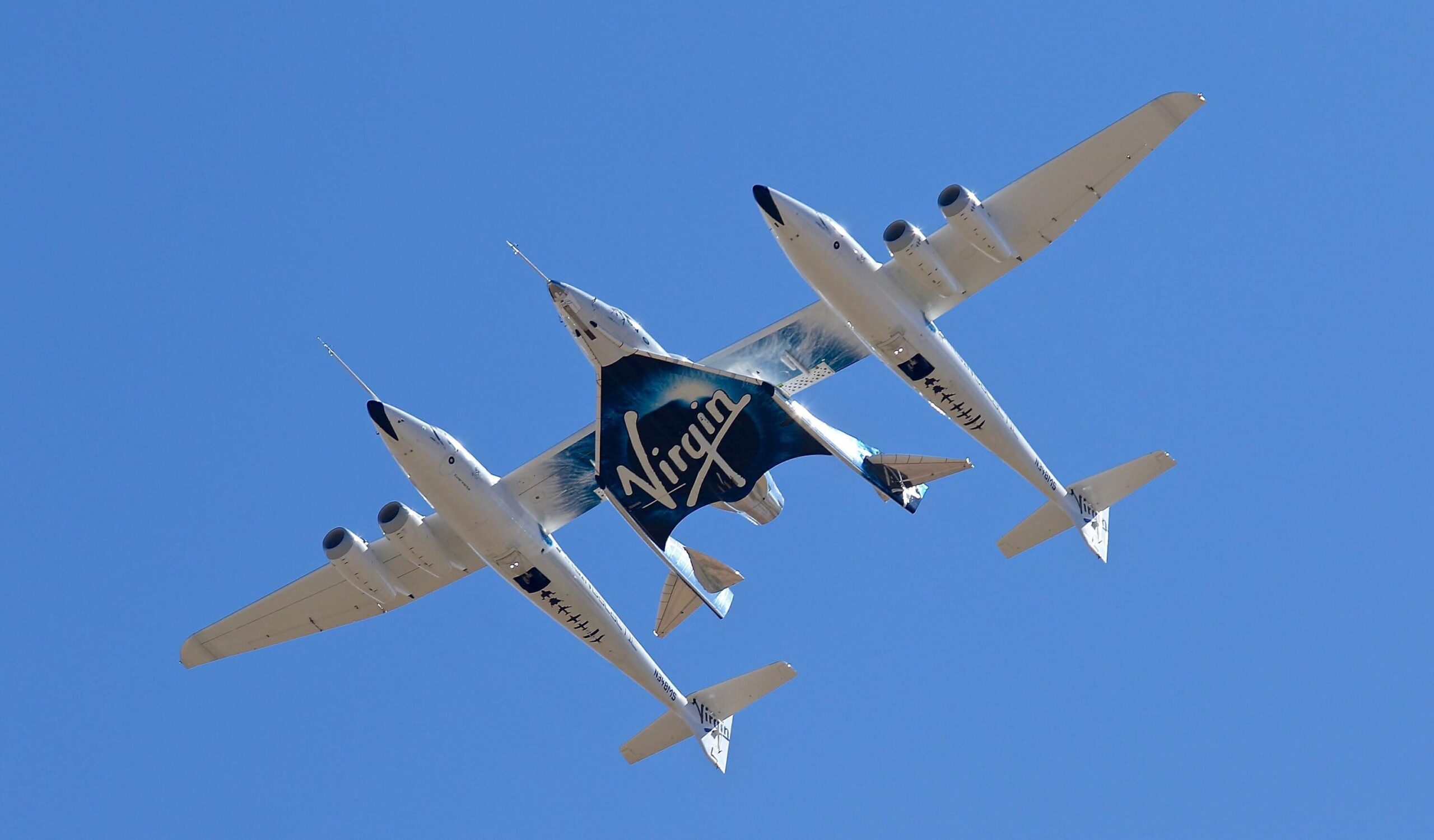 Virgin Galactic’s flight reaches edge of space, becoming first company to carry passengers into space